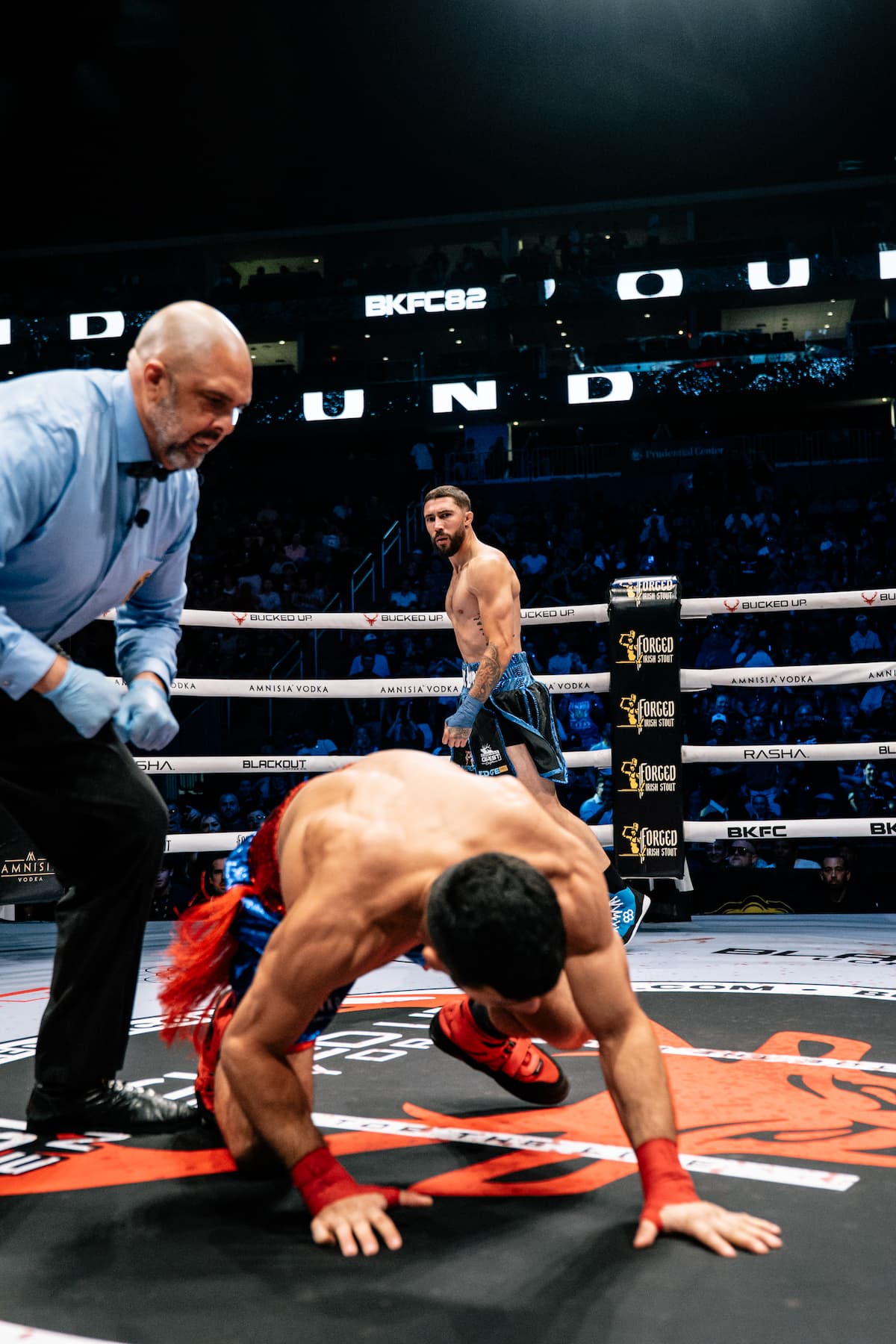 Michael Trizano knocks down Juan Carlos De Leon