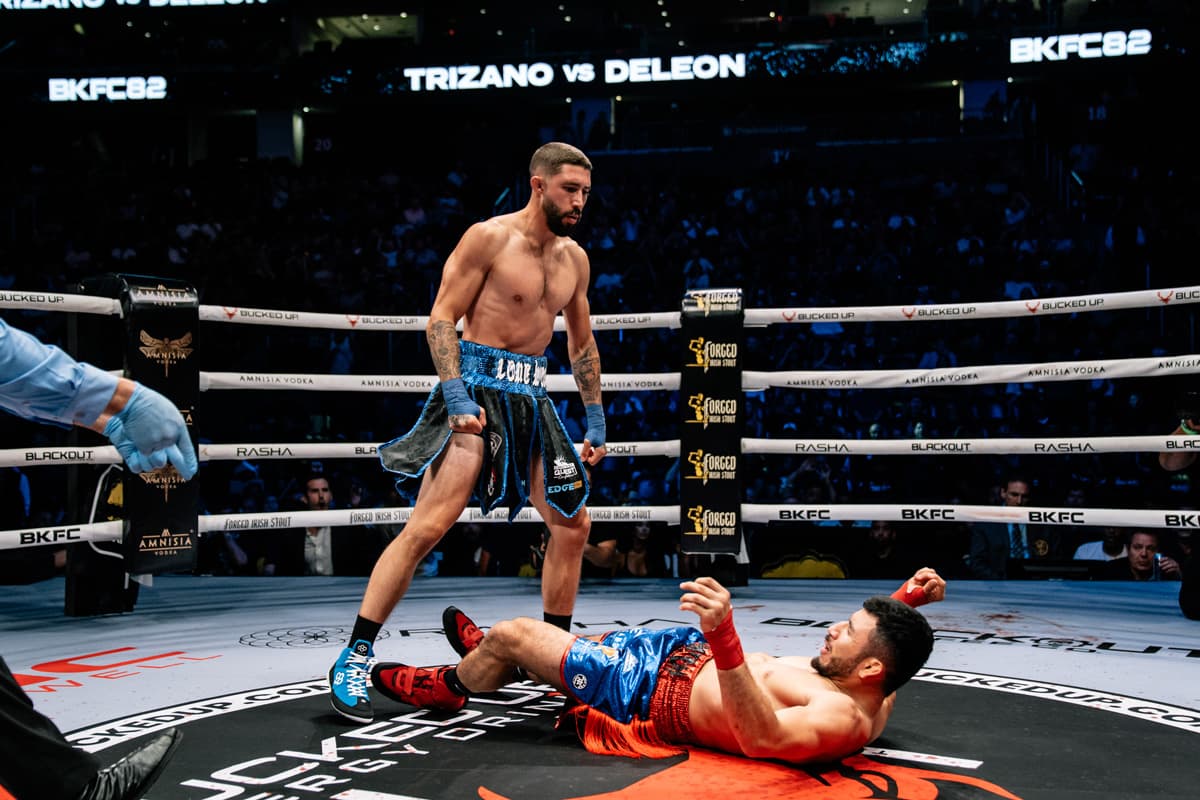Michael Trizano knocks down Juan Carlos De Leon