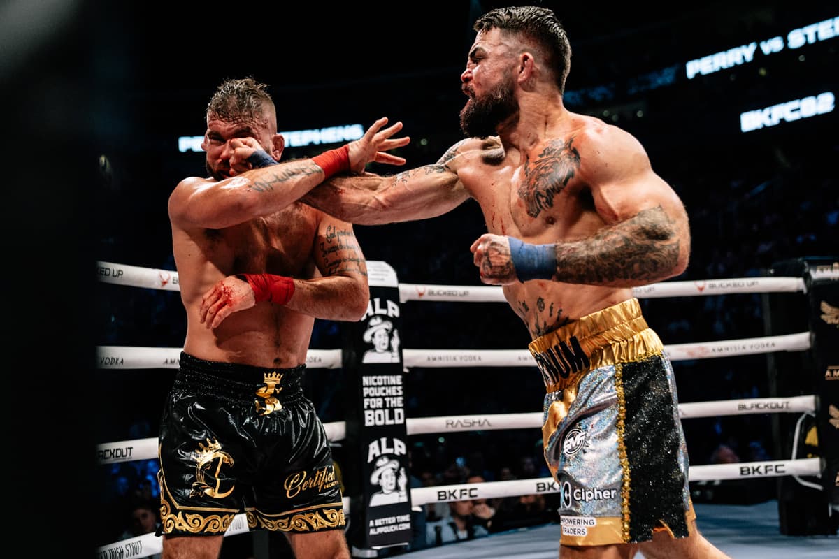 Mike Perry punches Jeremy Stephens during their bout