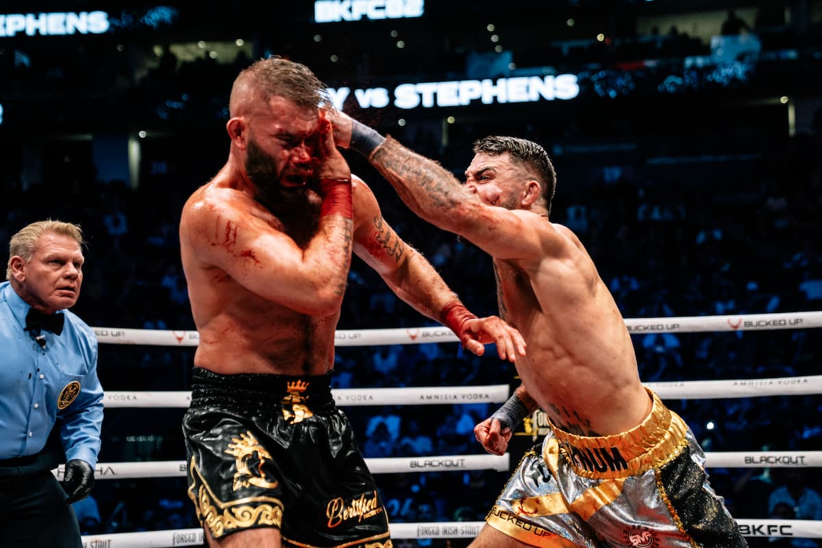 Mike Perry punches Jeremy Stephens during their bout