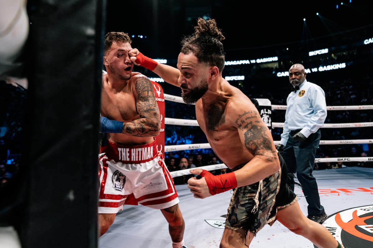 Quentin Gaskins punches Phil Caracappa