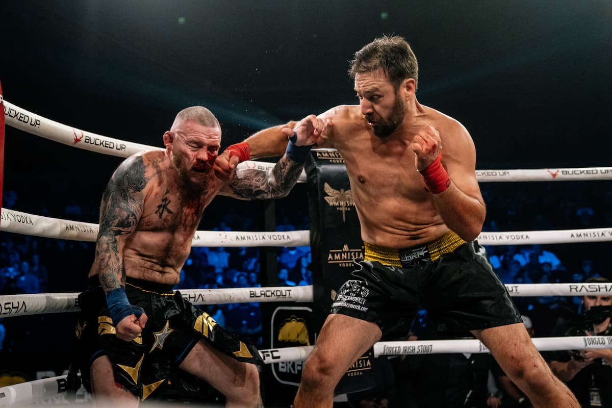 Thomas Angeloff punches Travis Smith