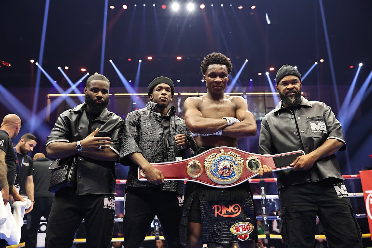 Abdullah Mason with his team after his victory over Sam Noakes