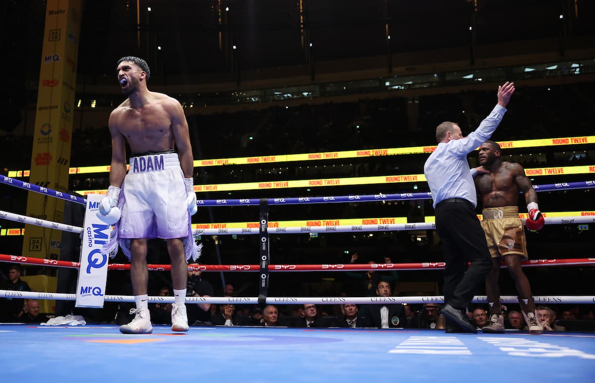 Adam Azim TKOs Kurt Scoby during their boxing bout