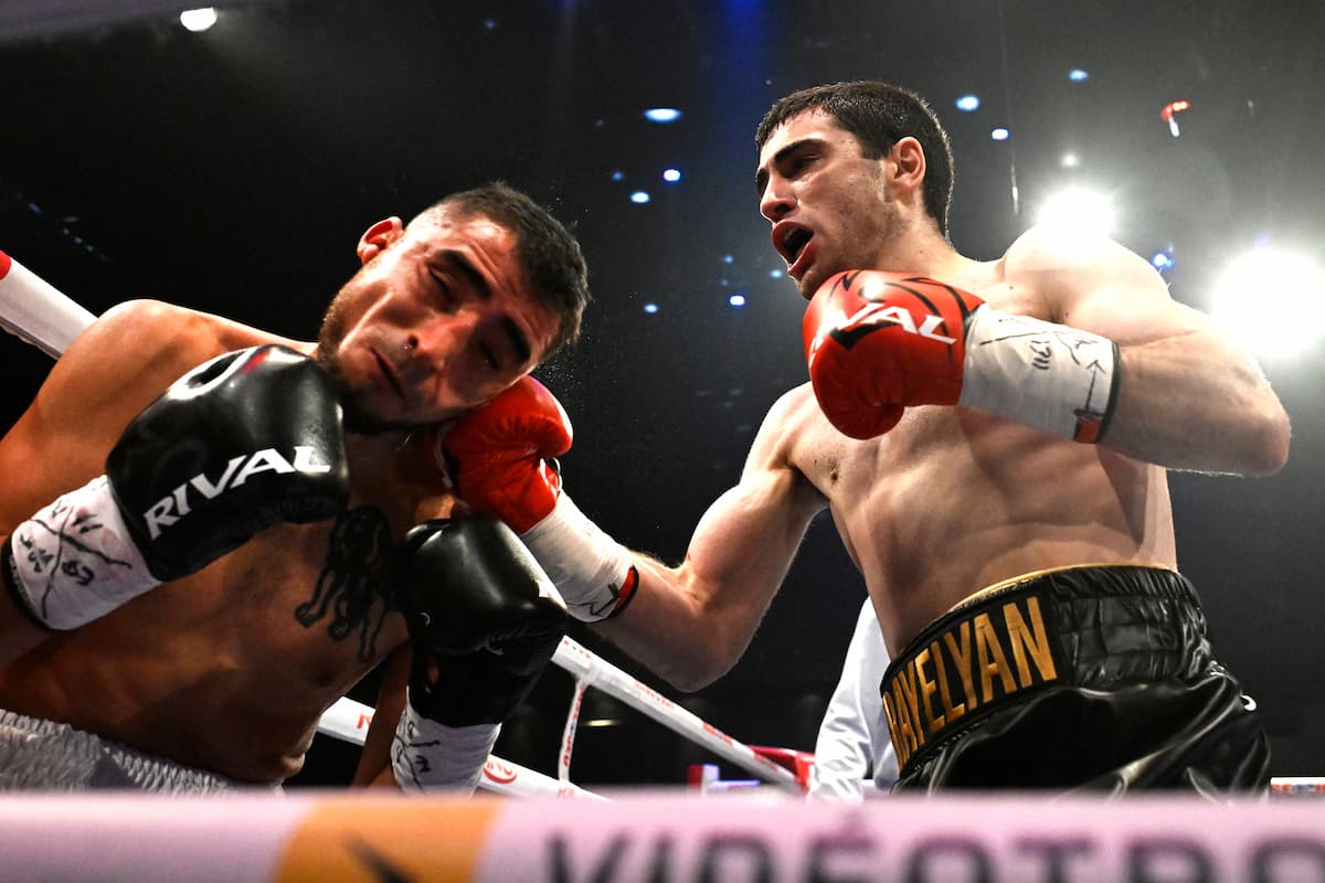 Erik Israyelyan punches Mario Esparza during their boxing bout