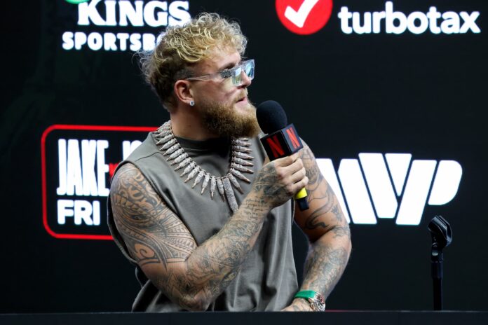 Jake Paul speaks during a press conference