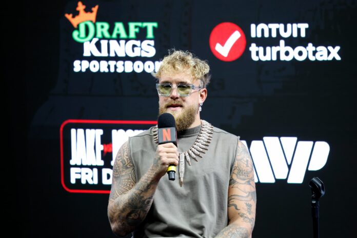 Jake Paul speaks during a press conference
