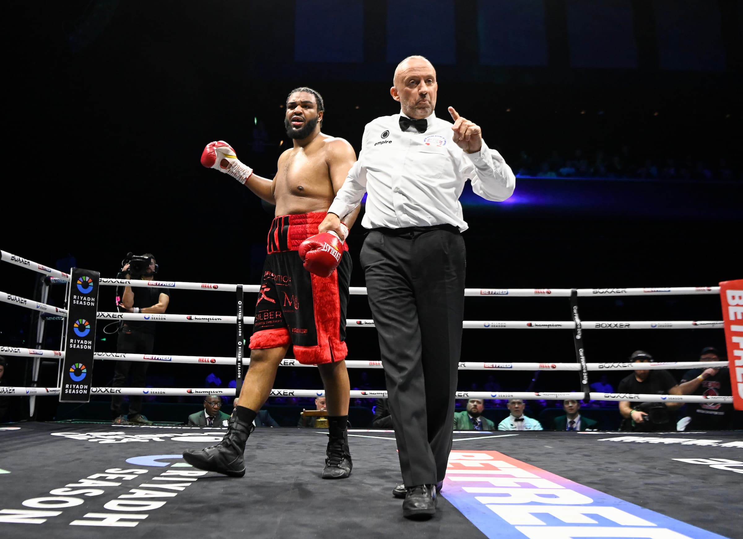 Jeamie Tshikeva gets a point deducted during his bout against Frazer Clarke