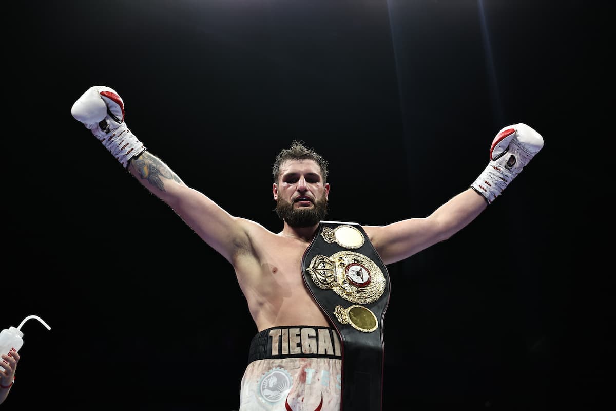 Liam Cameron victorious over Troy Jones during their boxing bout
