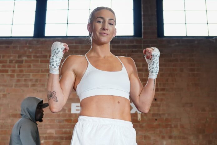 Mikaela Mayer poses during a media workout