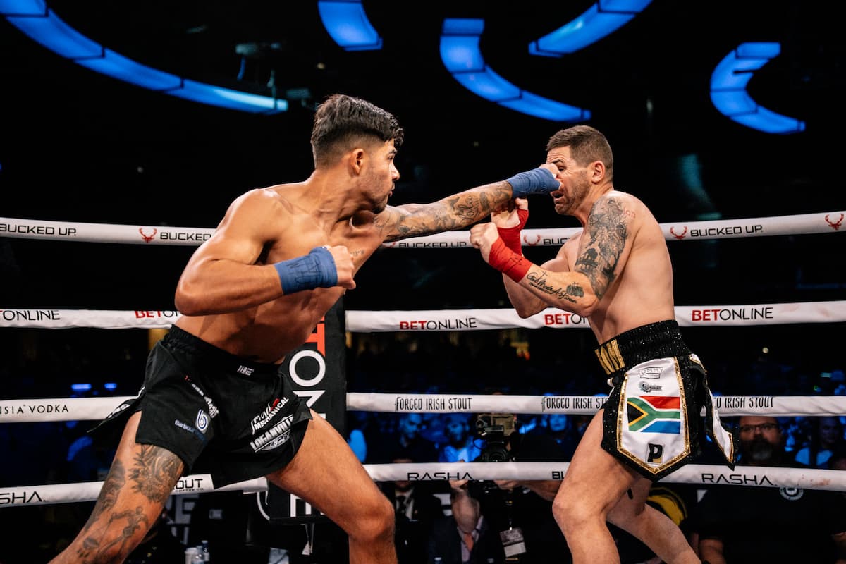 Nathan Rivera throws a jab during his bout against Tommy Strydom