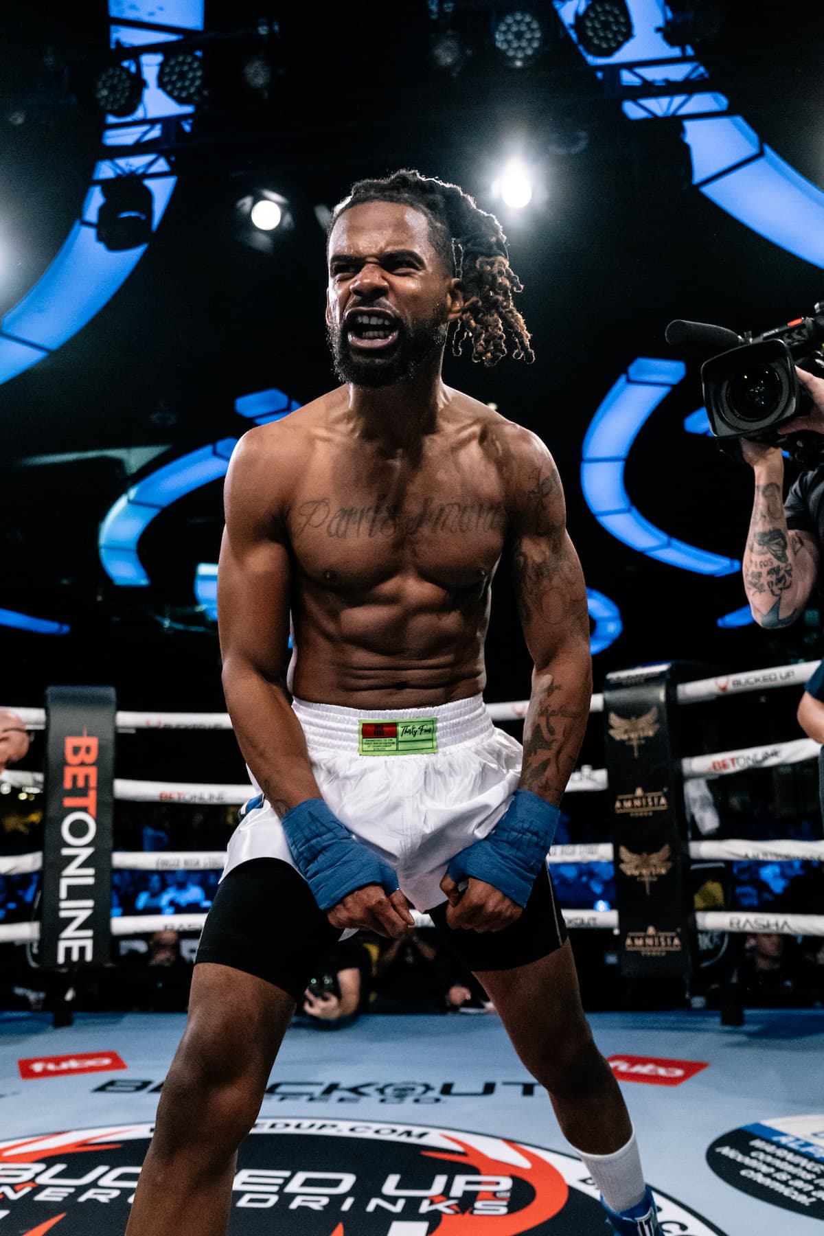 Paris Boyd celebrates victory over Ruben Arroyo