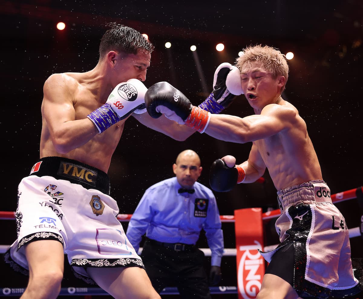 David Picasso punches Naoya Inoue during their bout
