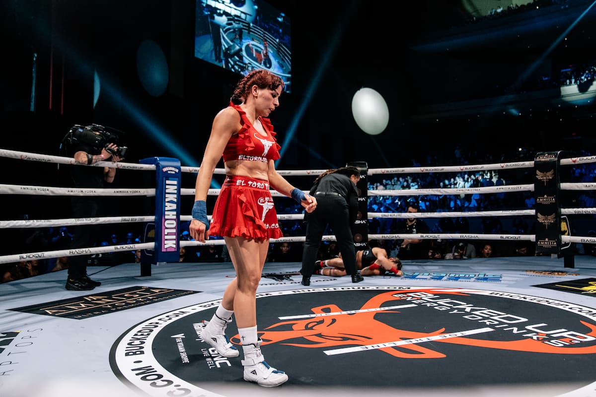 Christine Vicens knocks down Carina Damm during their bare knuckle boxing bout