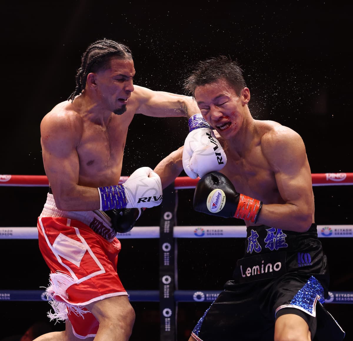 Eridson Garcia punches Taiga Imanaga during their bout