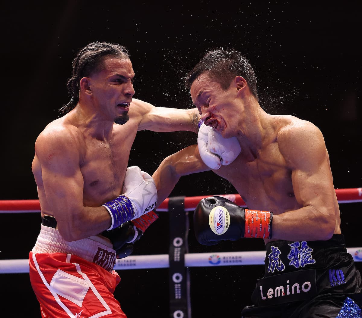Eridson Garcia punches Taiga Imanaga during their boxing bout