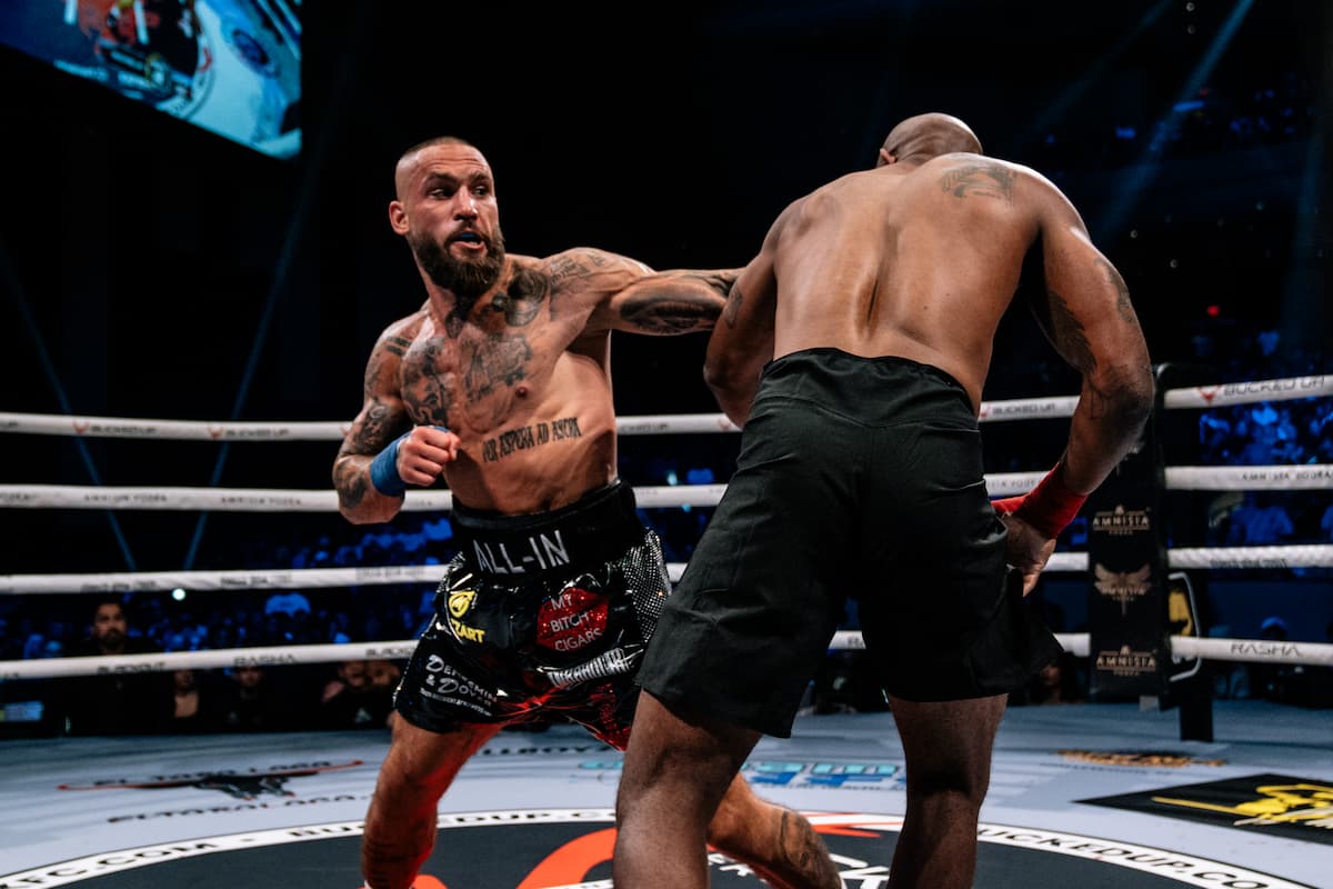 Gorjan Slaveski punches Ja'Far Fortt during their bout