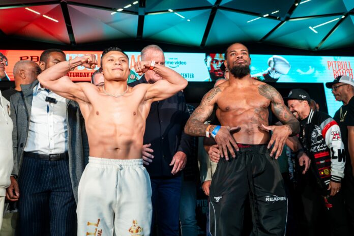 Isaac 'Pitbull' Cruz and Lamont Roach Jr during the weigh-in