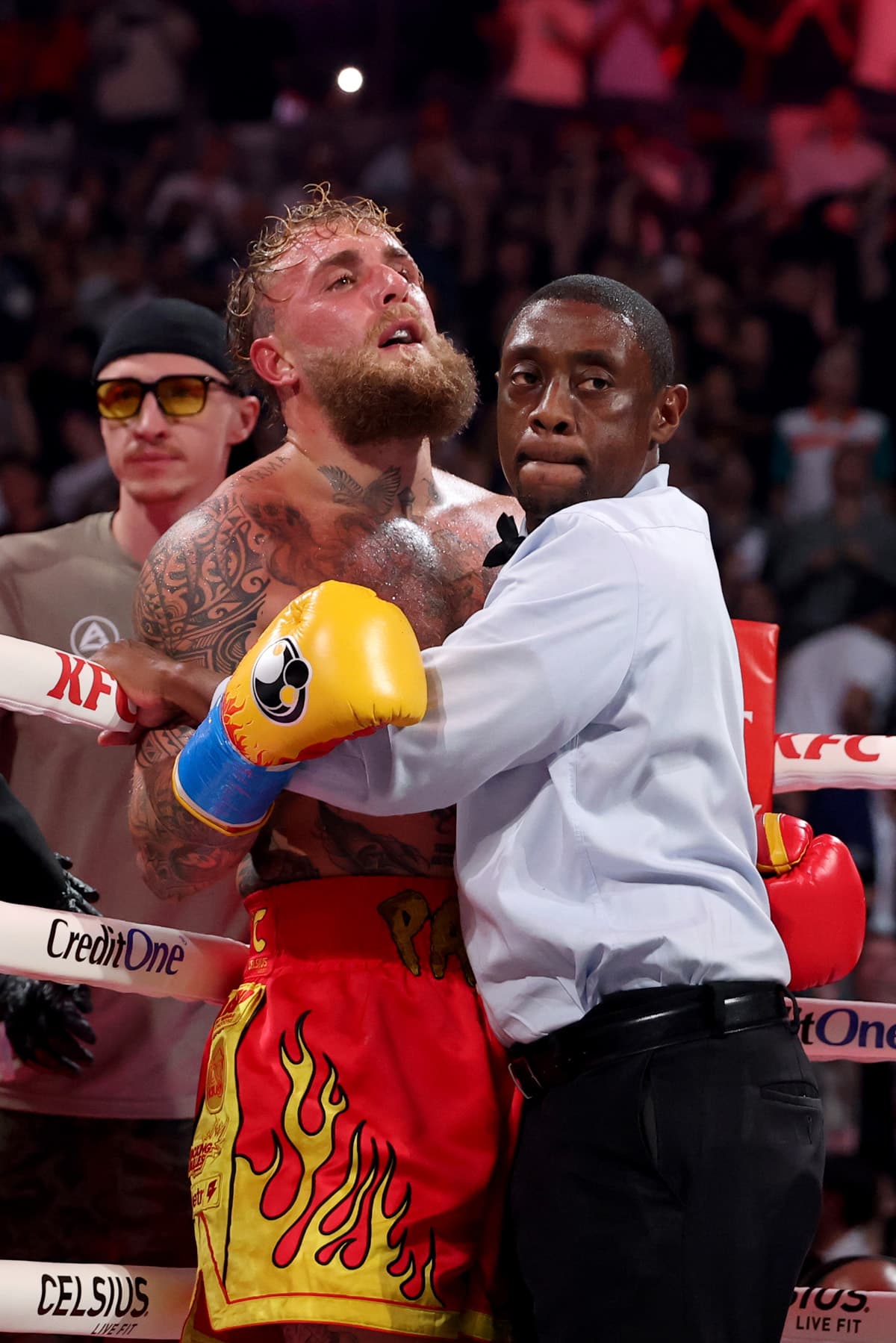 Boxer Jake Paul and referee Chris Young during Paul's fight against Anthony Joshua