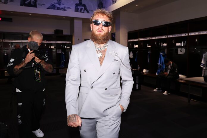 Jake Paul wearing a grey suit before his fight against Mike Tyson at AT&T Stadium in Arlington, Texas