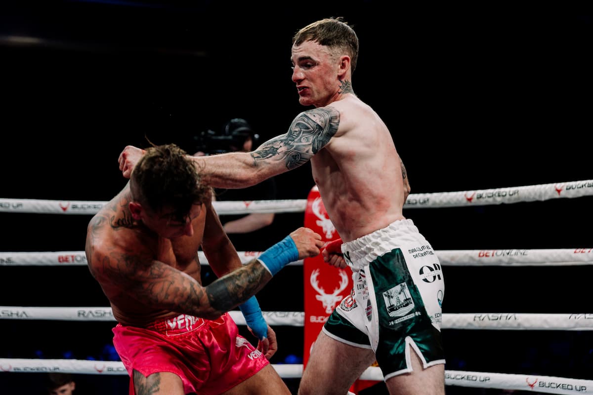 Lewis Knox throws a punch during his bout against Robbie Brown