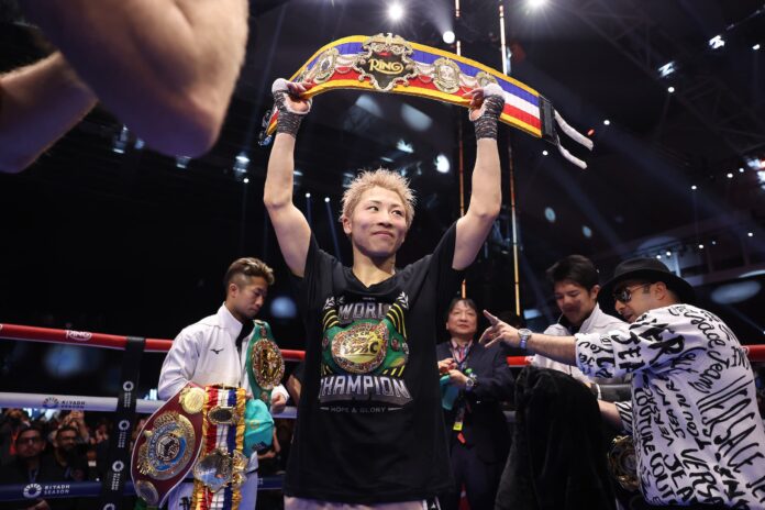 Naoya Inoue celebrates his victory over David Picasso during their boxing bout