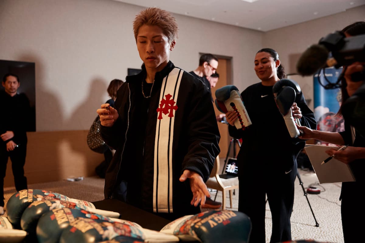 Naoya Inoue signs boxing gloves