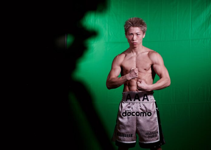 Naoya Inoue posing in front of a green screen during Media Day ahead of Ring V