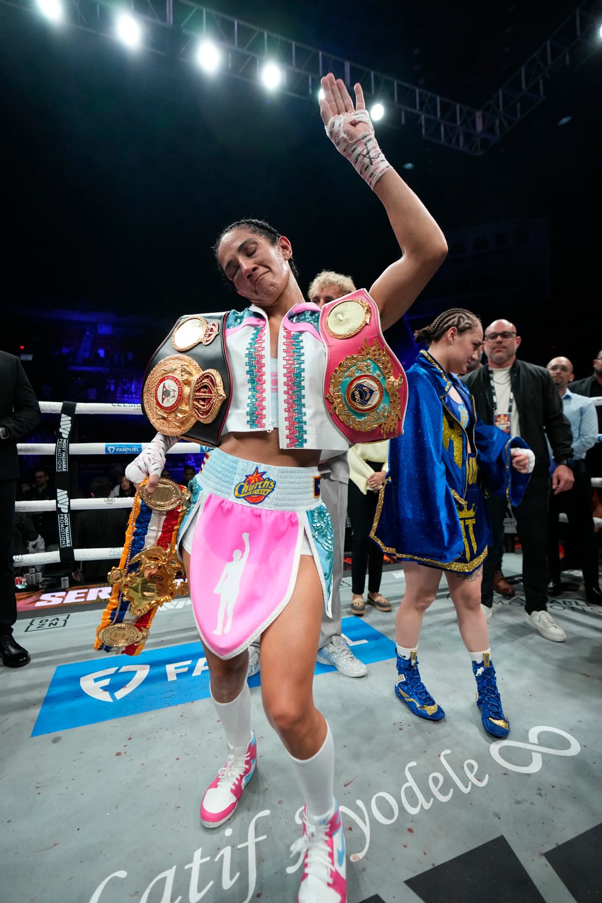 Amanda Serrano with her championship belts