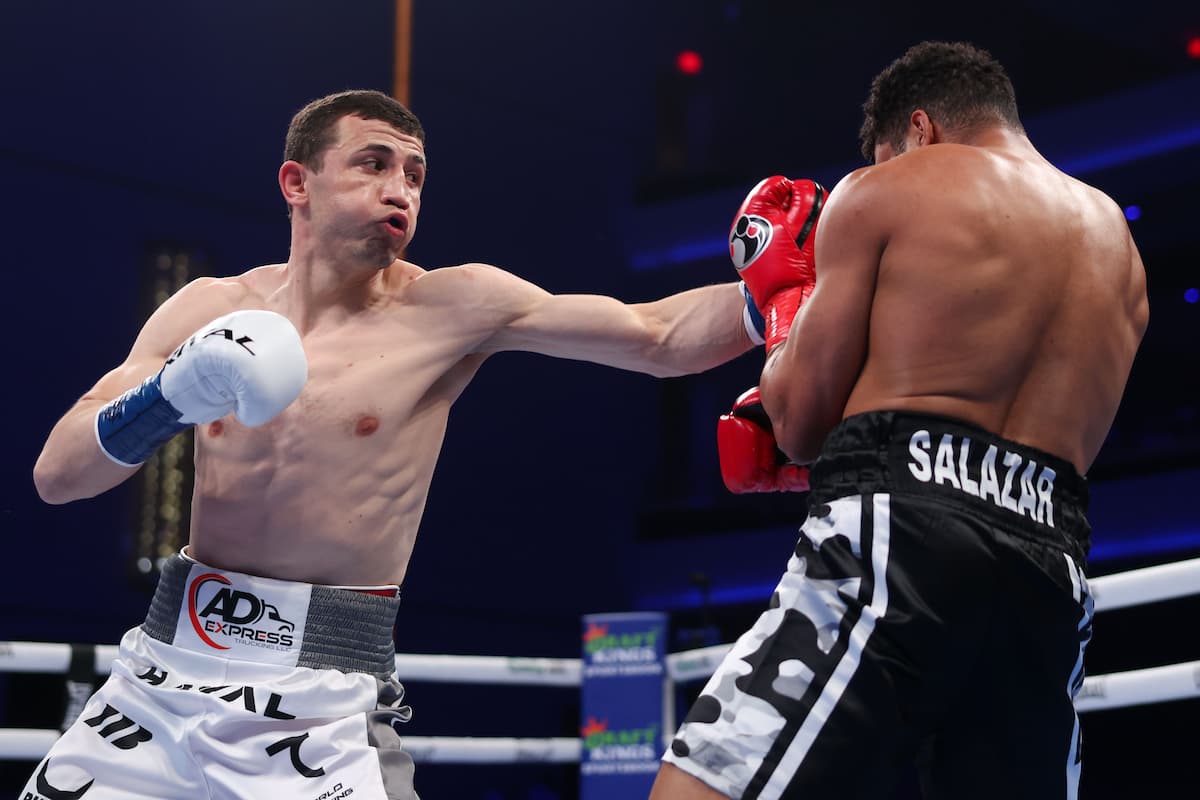 Israil Madrimov connects a punch during his bout against Luis David Salazar