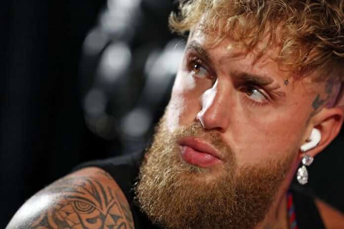 Jake Paul prepares in his dressing room before the heavyweight bout against Anthony Joshua