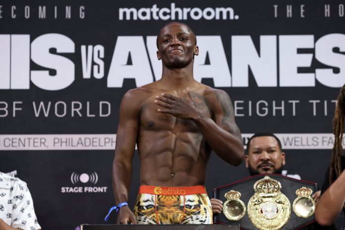 Jalil Hackett standing on scales during a weigh-in