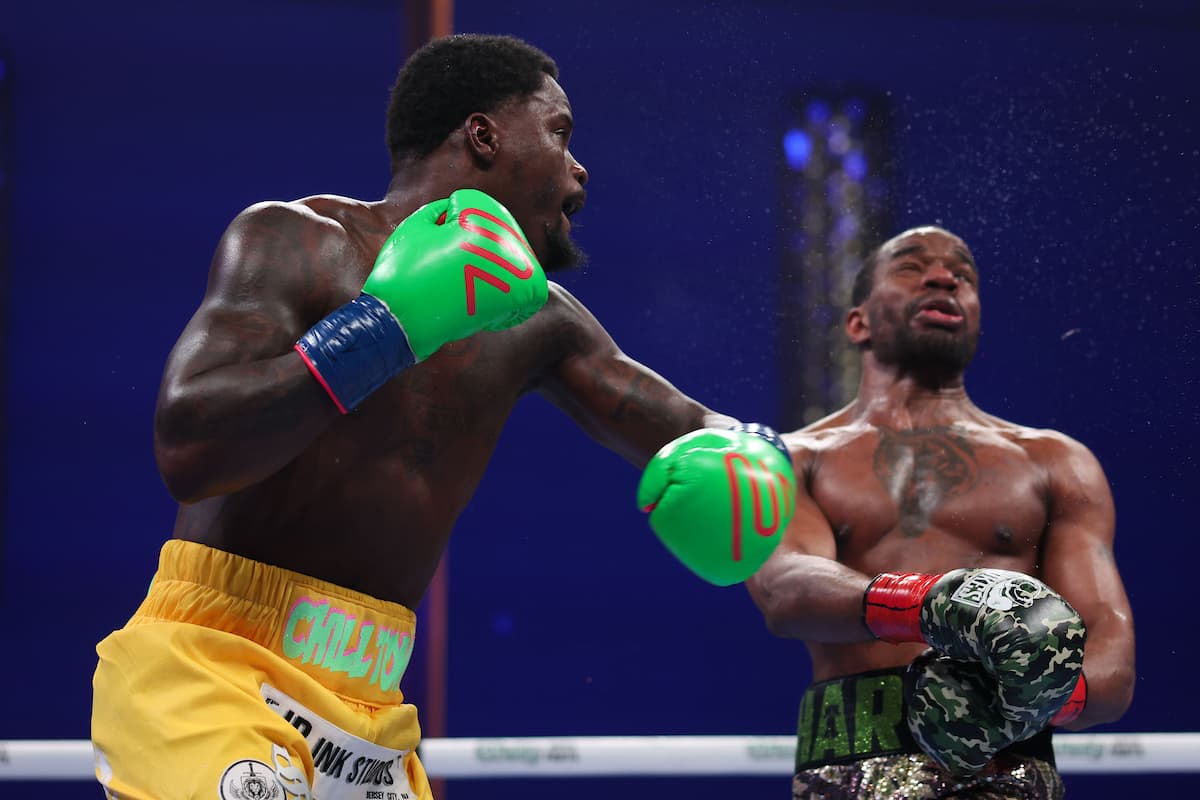 Khalil Coe throws a hook during his bout against Jesse Hart
