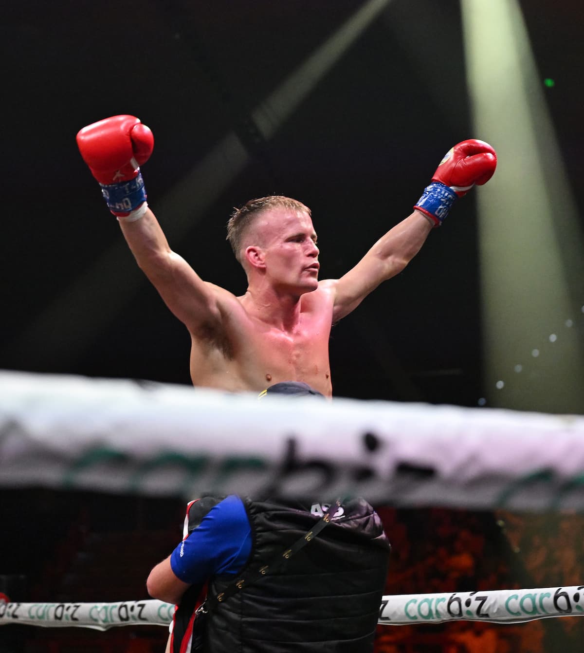 Liam Wilson celebrates his victory over Rodex Piala