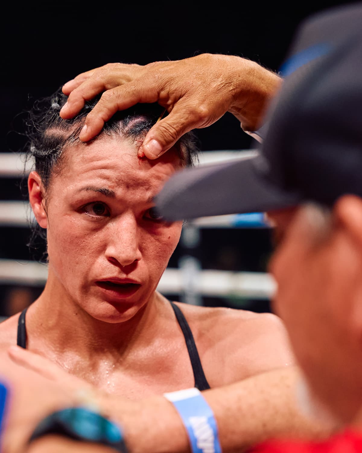 Stephanie Han suffers a cut during her bout against Holly Holm