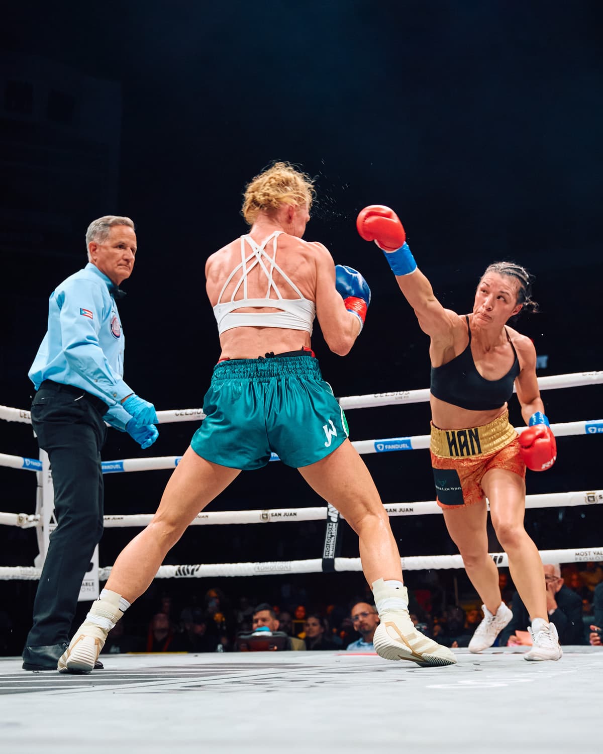 Stephanie Han throws a punch during her bout against Holly Holm