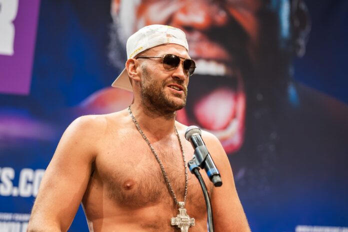 Tyson Fury speaks during a press conference