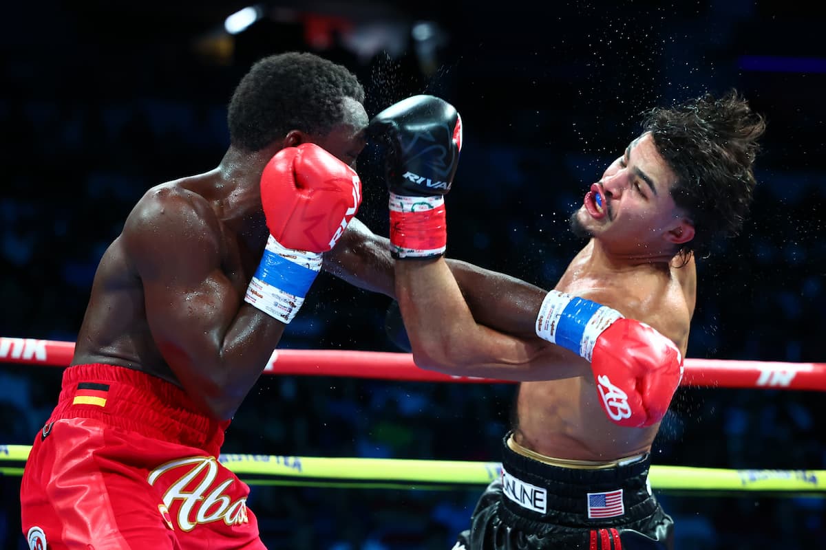 Xander Zayas throws an uppercut during his bout against Abass Baraou