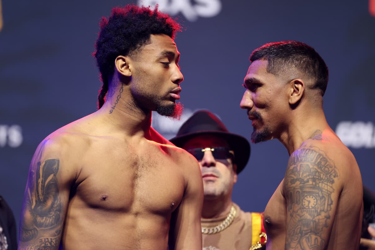 Amari Jones and Luis Arias face off during the weigh-in ahead of their boxing match