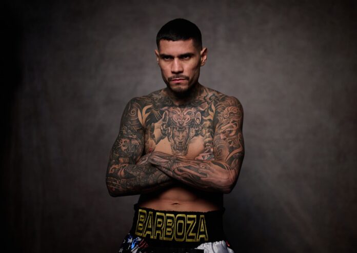 Arnold Barboza posing during a media day ahead of his boxing match