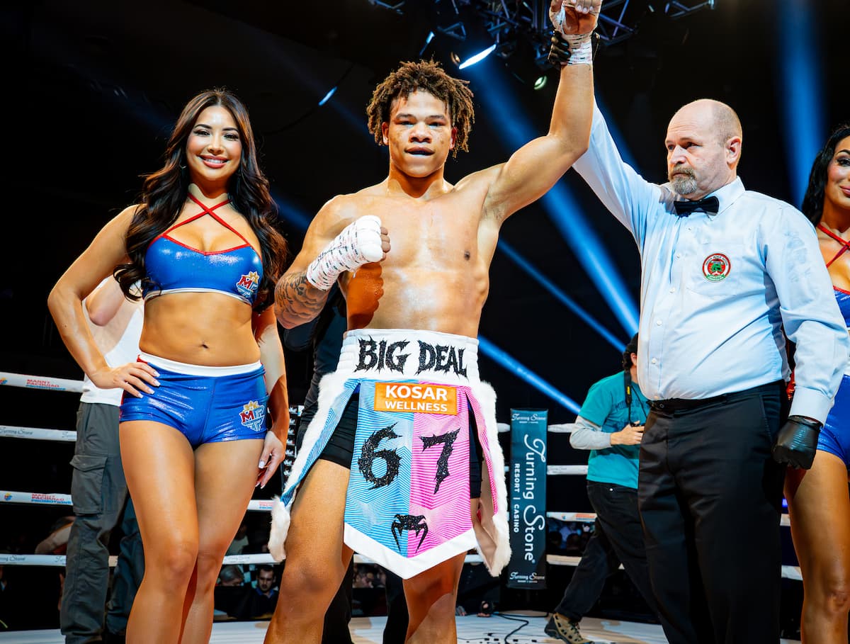 Curmel Moton victorious over Wilfredo Flores during the boxing match