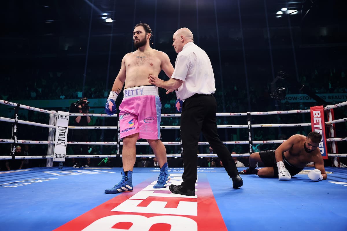 David Allen knocks down Karim Berredjem during their bout
