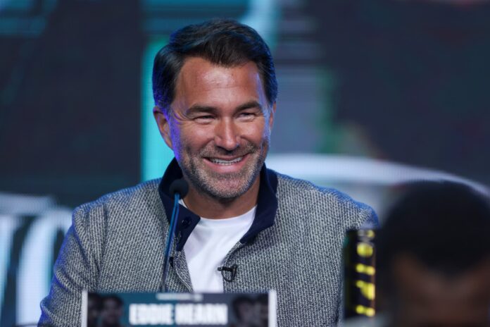 Chairman of Matchroom Boxing, Eddie Hearn smiles at the press conference