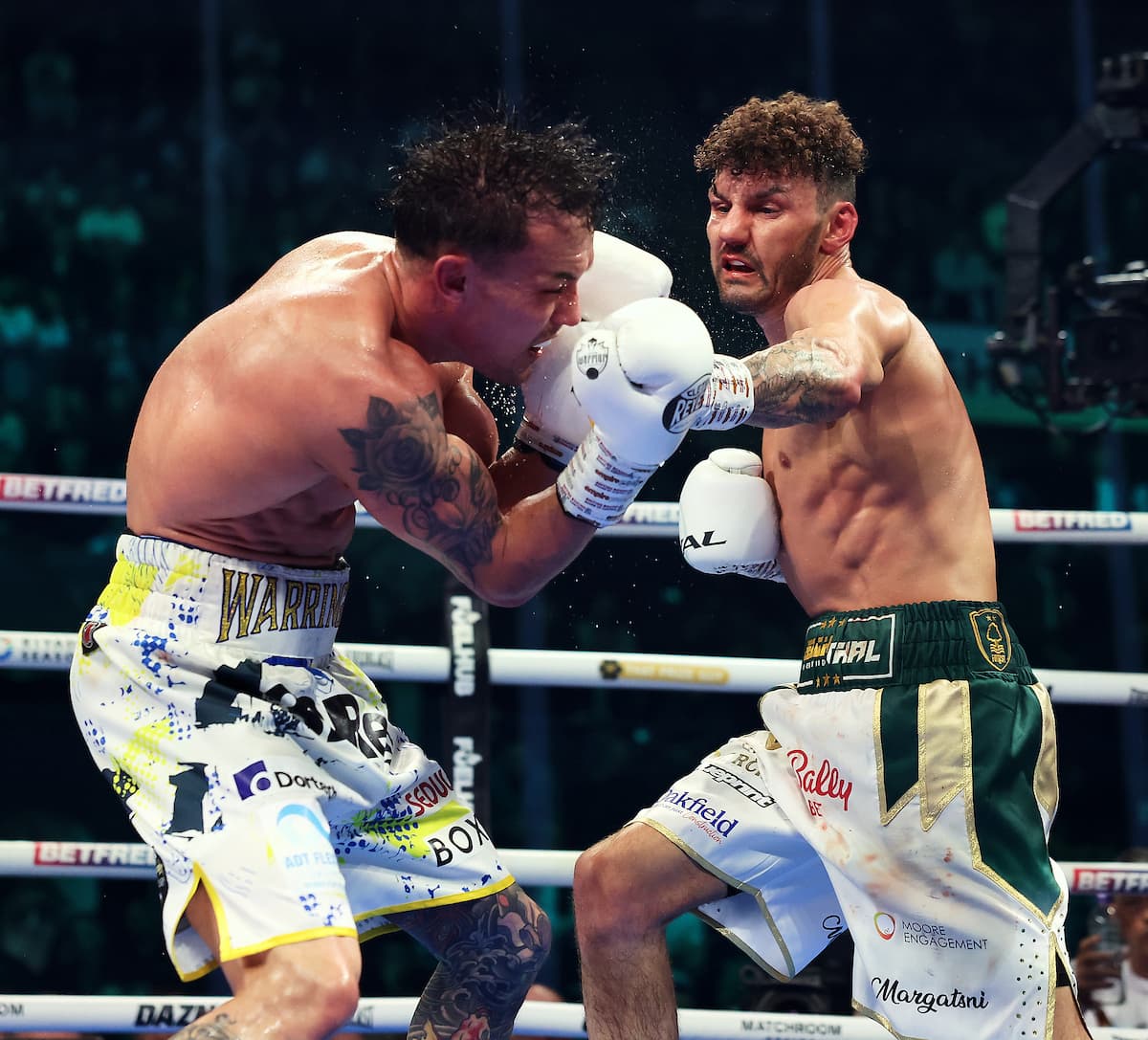 Leigh Wood lands a punch during his bout against Josh Warrington