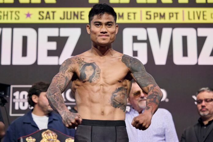 Mark Magsayo during the weigh-in ahead of his boxing match