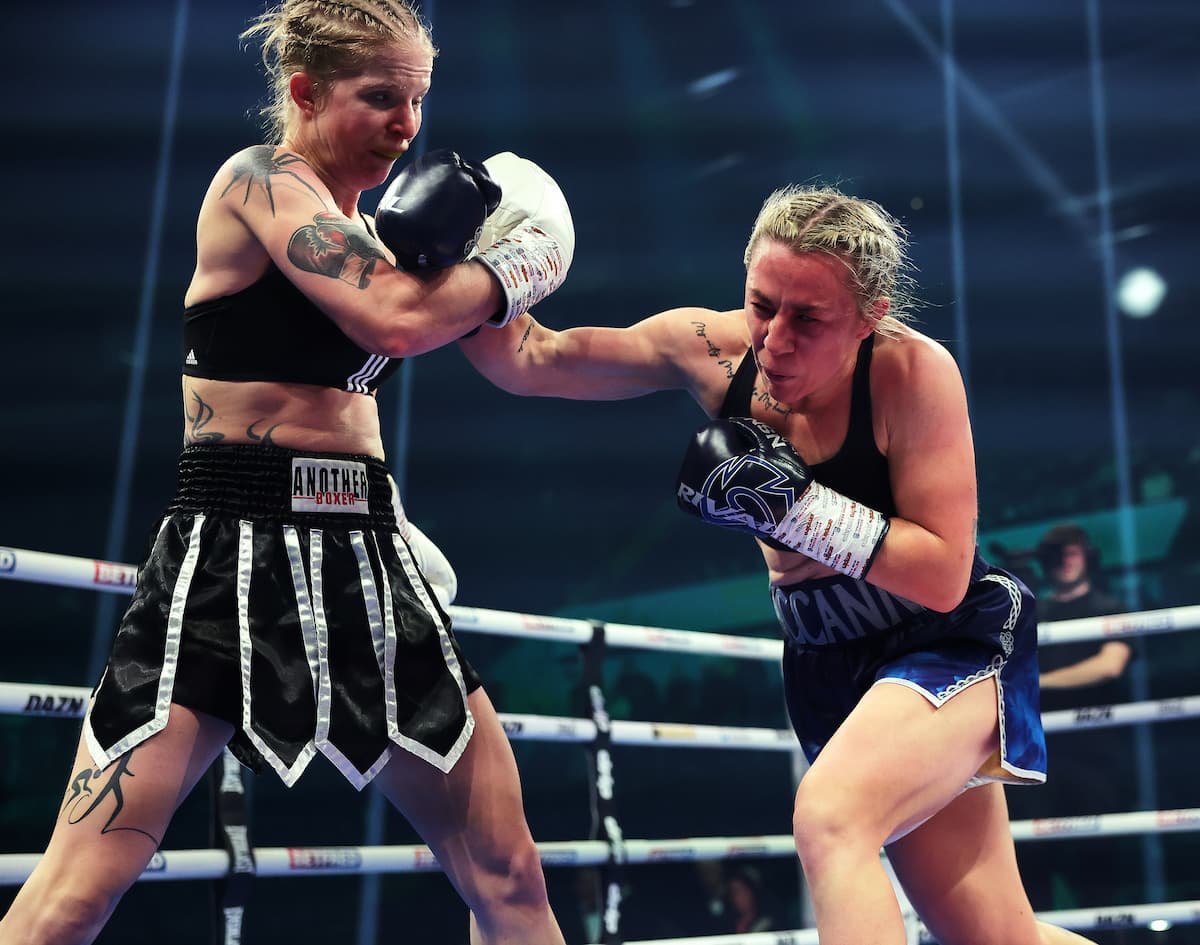 Molly McCann throws a punch during her bout against Beata Dudek