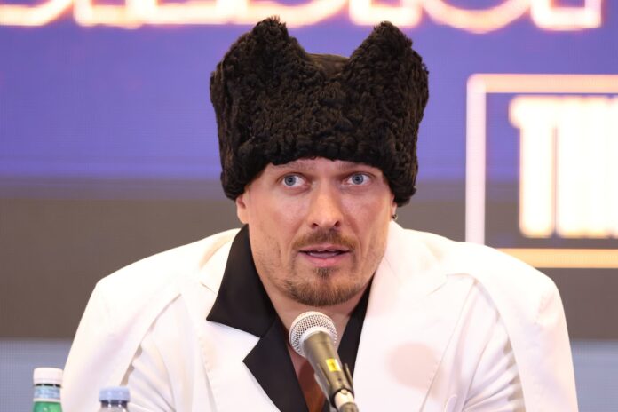 Oleksandr Usyk speaking during a press conference ahead of his boxing match