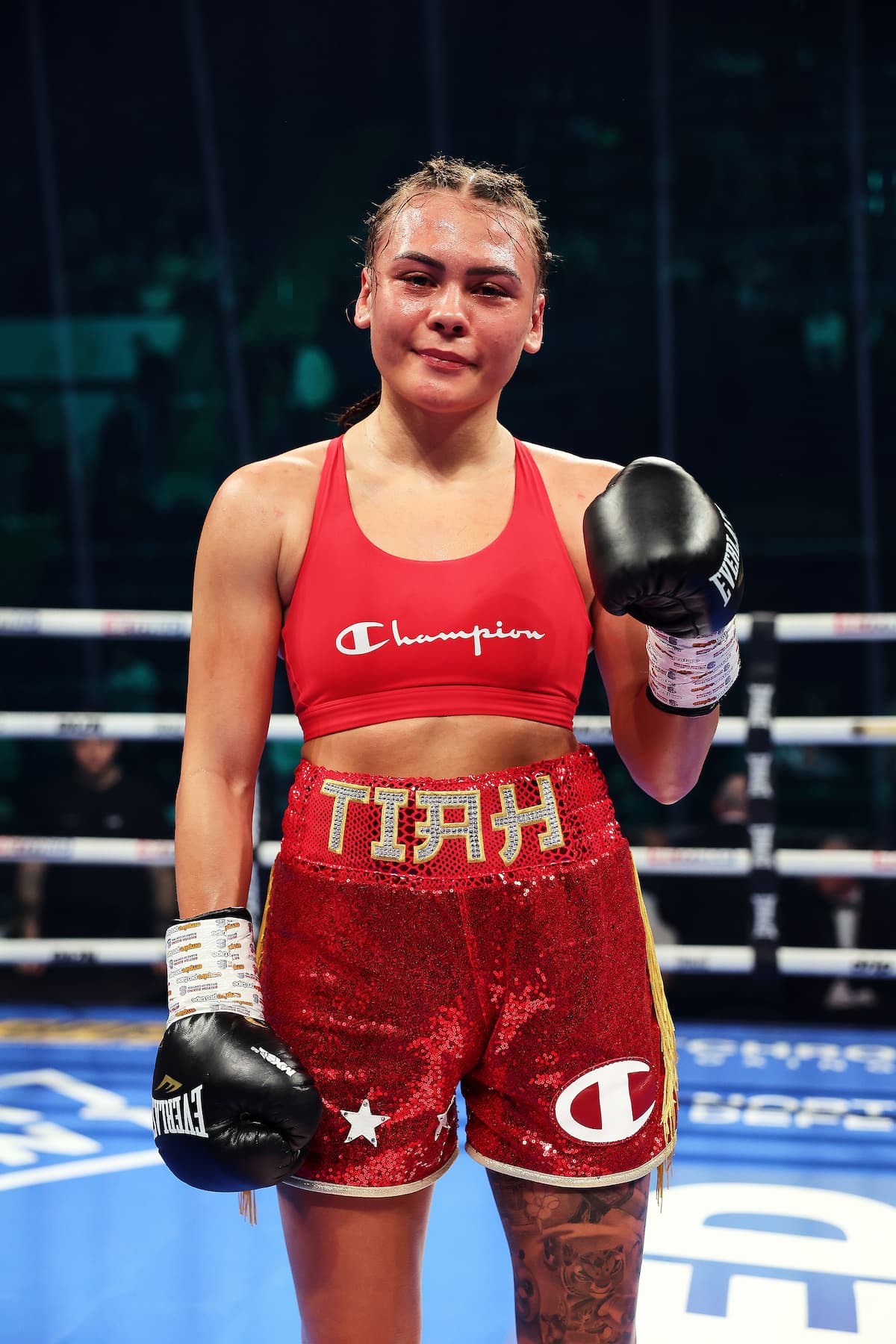 Tiah-Mai Ayton posing in the ring after her victory over Catherine Tacone Ramos during their boxing match