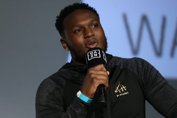 Viddal Riley speaking during a press conference