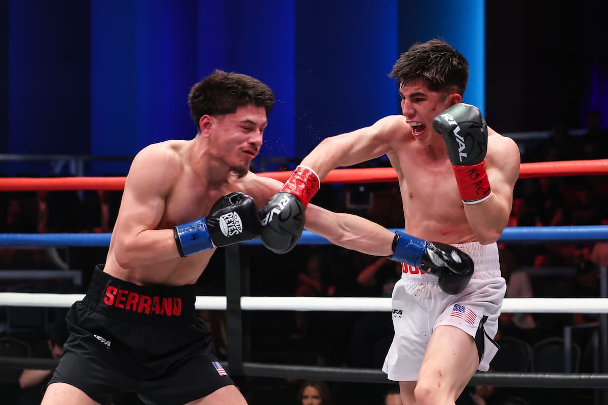 Brady Ochoa throws a punch during his boxing match against Adrian Serrano